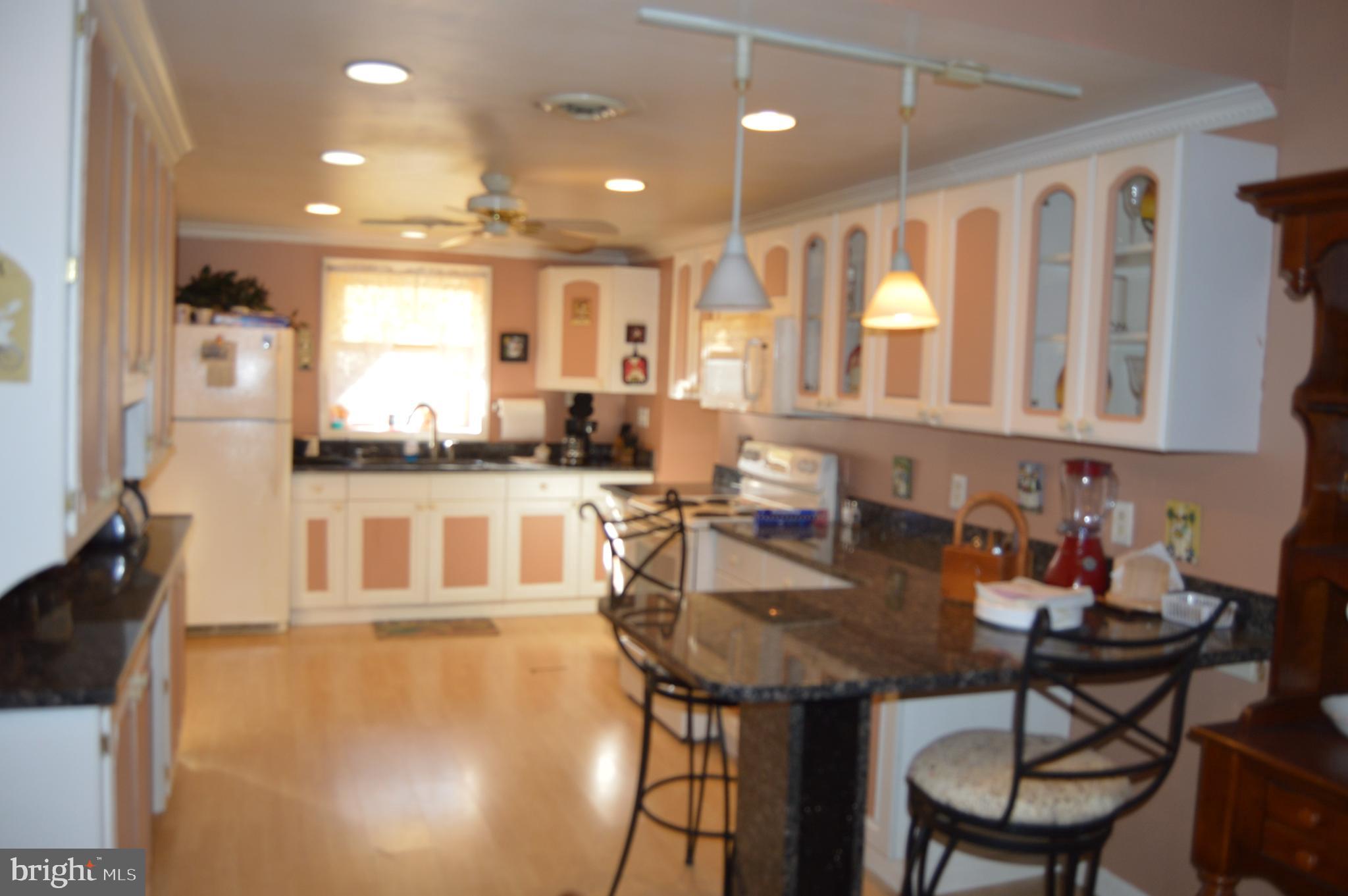 830 Swift Road Pasadena, MD 21122 - Photo 7 of 37 Kitchen w/Granite Countertops