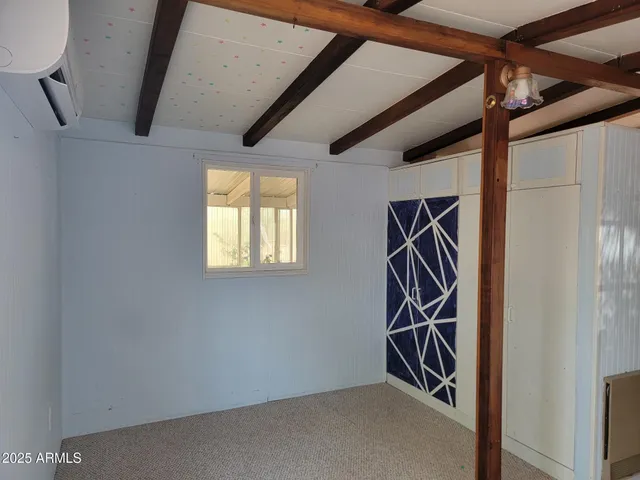 a utility room with windows