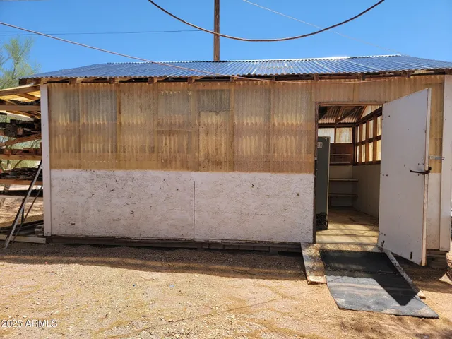 a bathroom with a shower and a sink