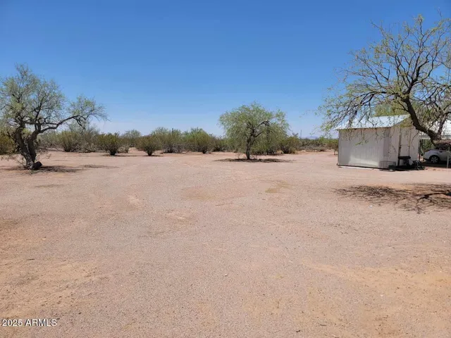 a view of a house with a snow in the yard