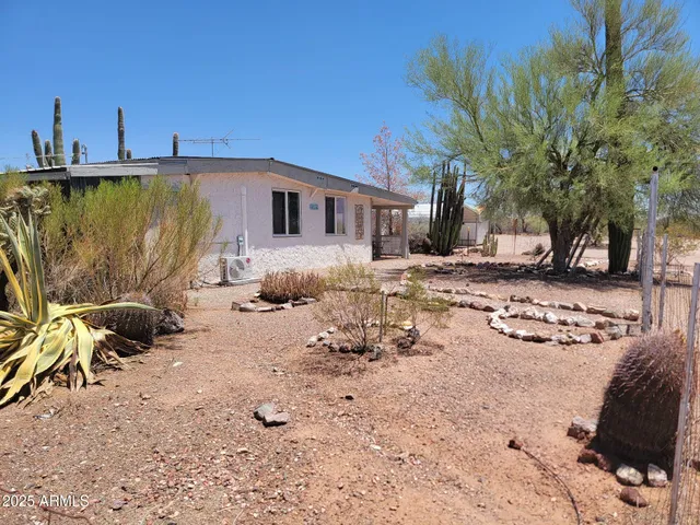 a view of a terrace with a barbeque
