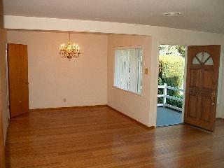 1161 Court Road Novato, CA 94945 - Photo 4 of 5 an empty room with wooden floor and windows