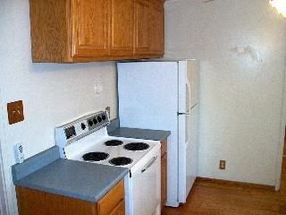 1161 Court Road Novato, CA 94945 - Photo 5 of 5 a kitchen with a sink a stove and a refrigerator