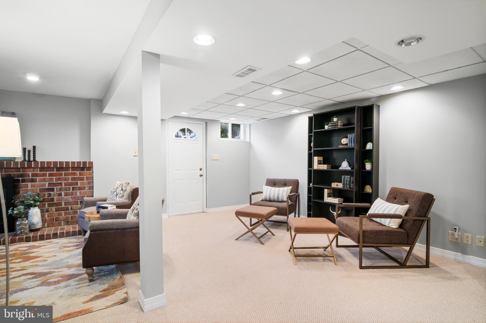 5409 Manorfield Road Rockville, MD 20853 - Photo 11 of 51 Sitting area (lower level)