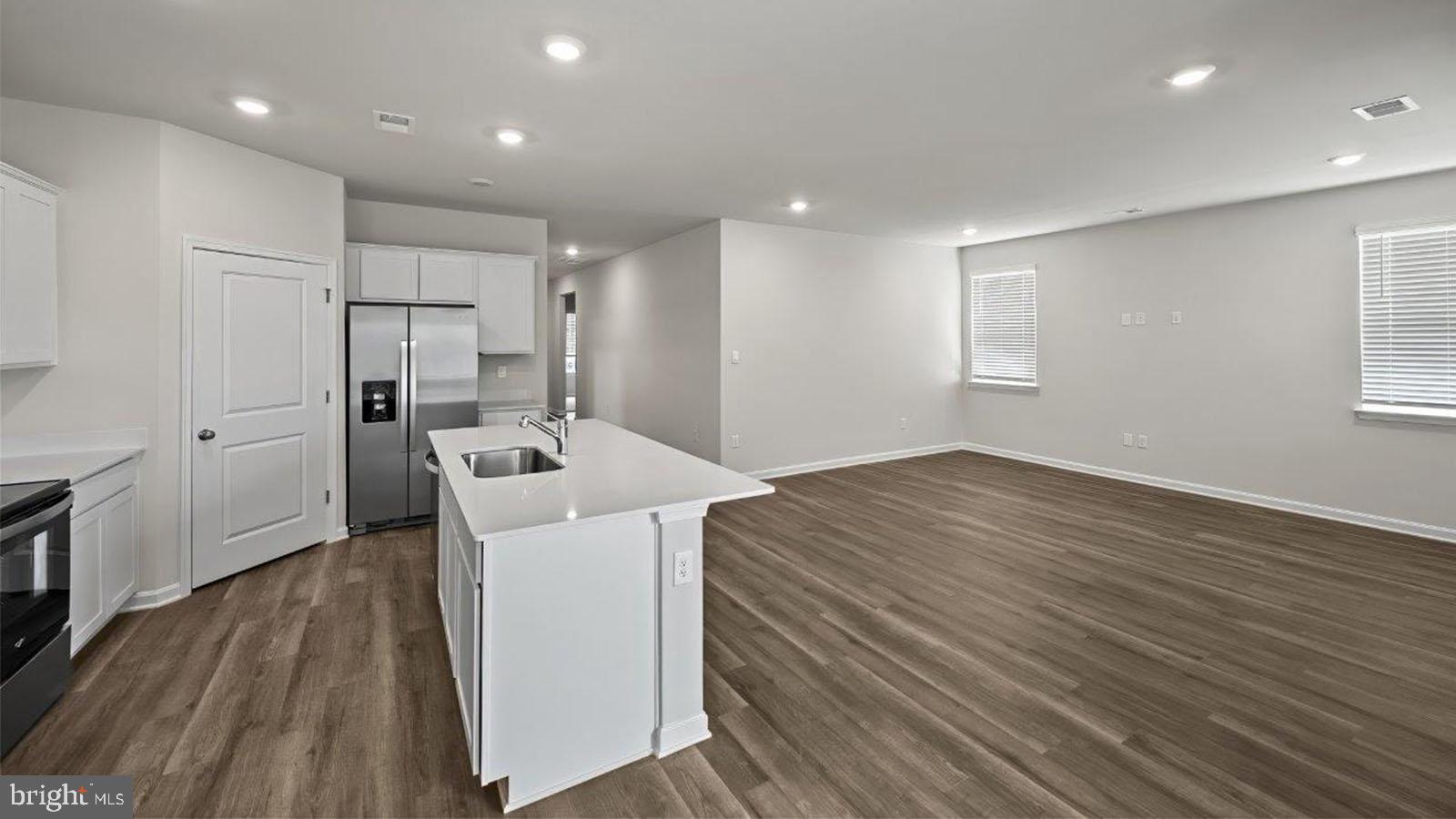42 Riderwood Way Shepherdstown, WV 25443 - Photo 8 of 28 a view of a kitchen with a sink and cabinets