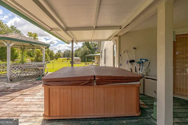 a swimming pool with trees in the background