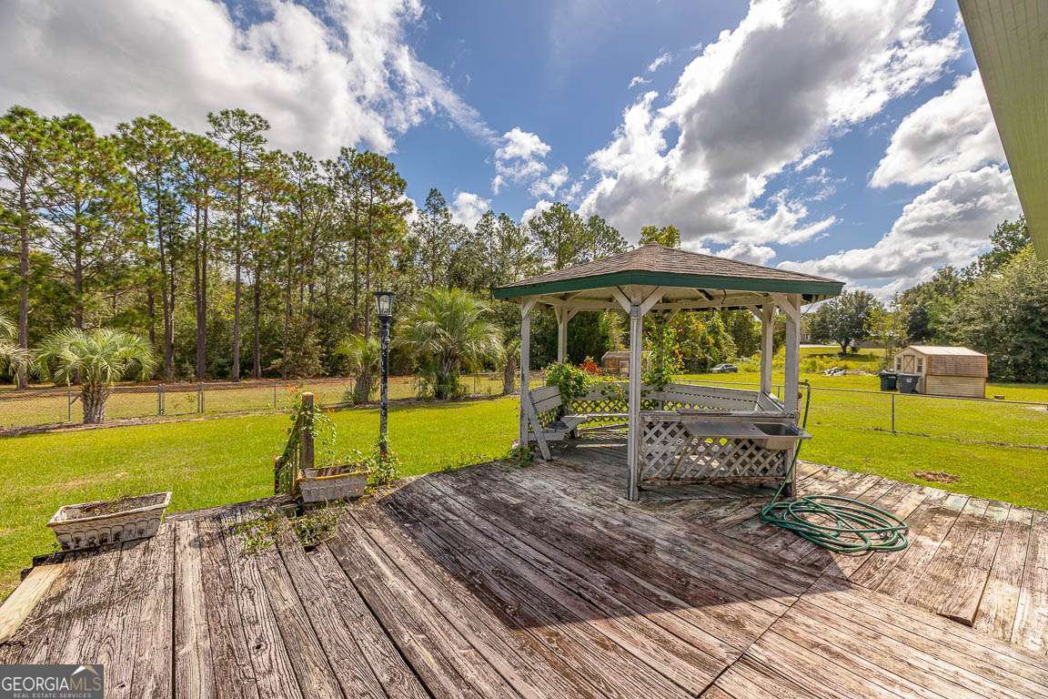 220 Chickasaw Road Hoboken, GA 31542 - Photo 22 of 55 a view of a swimming pool with a patio
