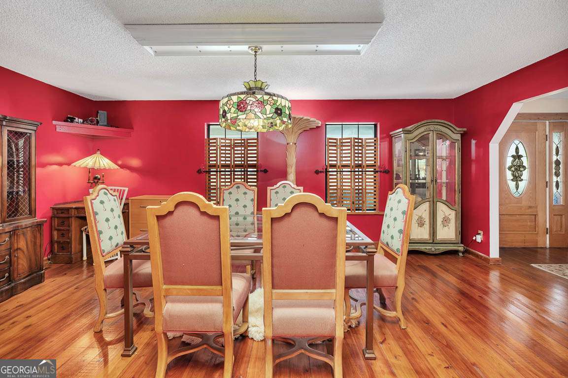 220 Chickasaw Road Hoboken, GA 31542 - Photo 33 of 55 a view of a dining room with furniture and chandelier