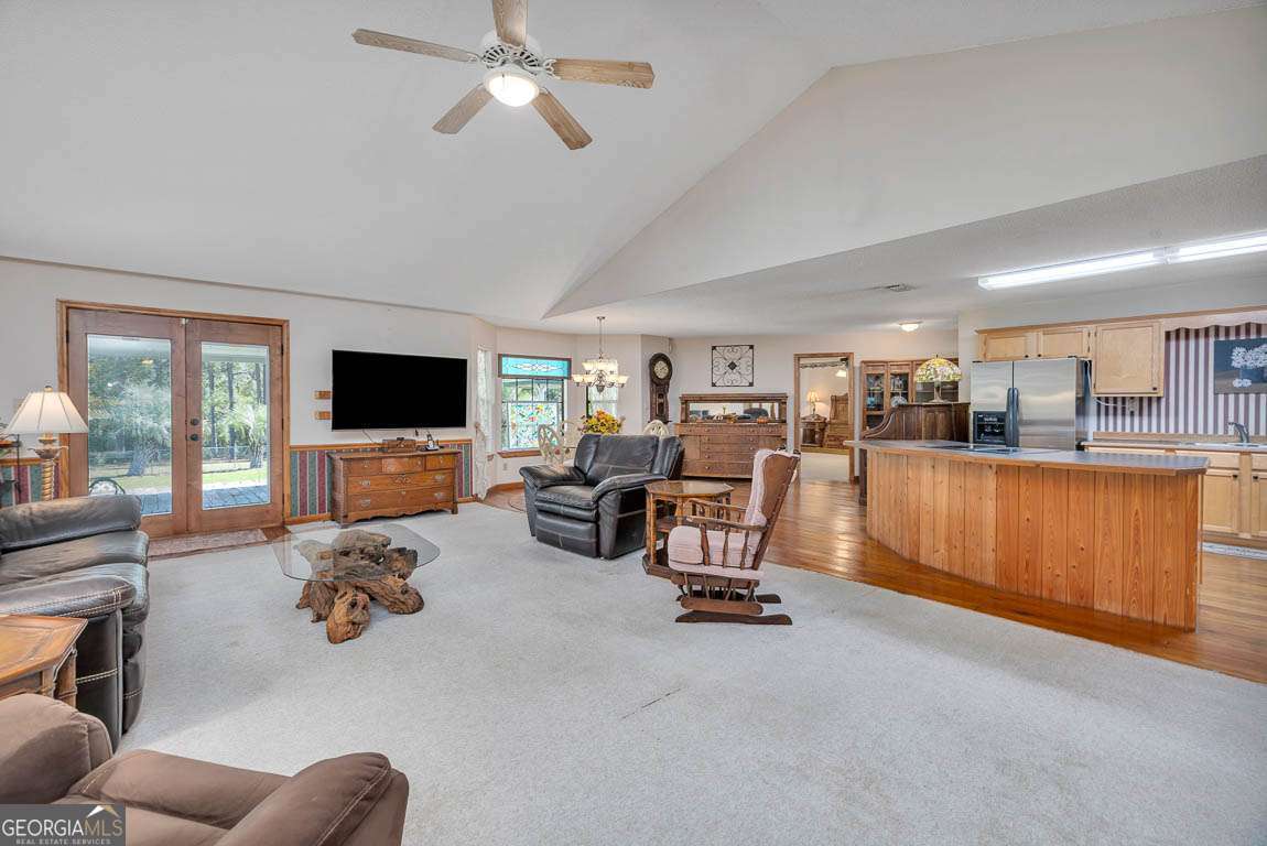 220 Chickasaw Road Hoboken, GA 31542 - Photo 38 of 55 a living room with furniture and a flat screen tv