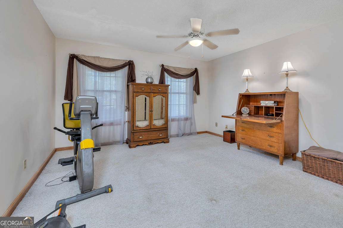 220 Chickasaw Road Hoboken, GA 31542 - Photo 43 of 55 a view of living room with furniture and a chandelier