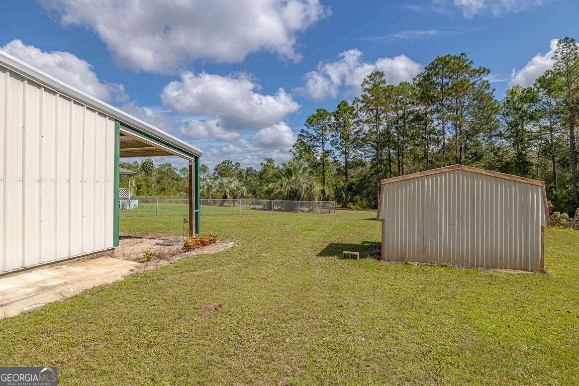 220 Chickasaw Road Hoboken, GA 31542 - Photo 5 of 55 a view of backyard with green space