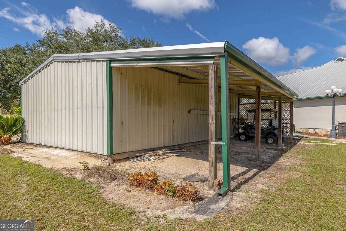 220 Chickasaw Road Hoboken, GA 31542 - Photo 7 of 55 a view of a house with backyard