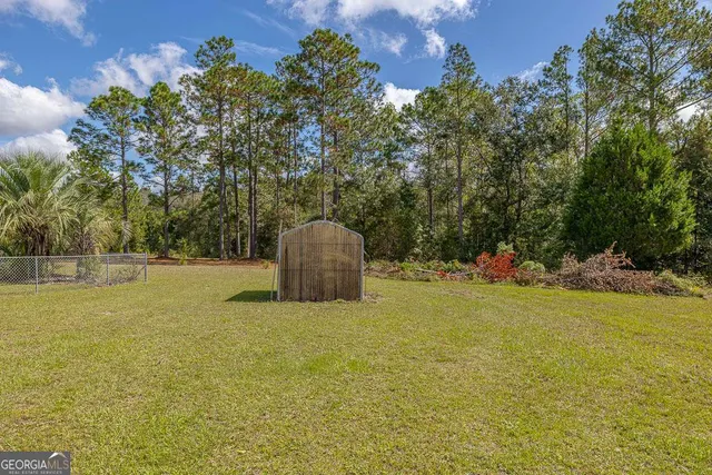 a swimming pool with wooden fence