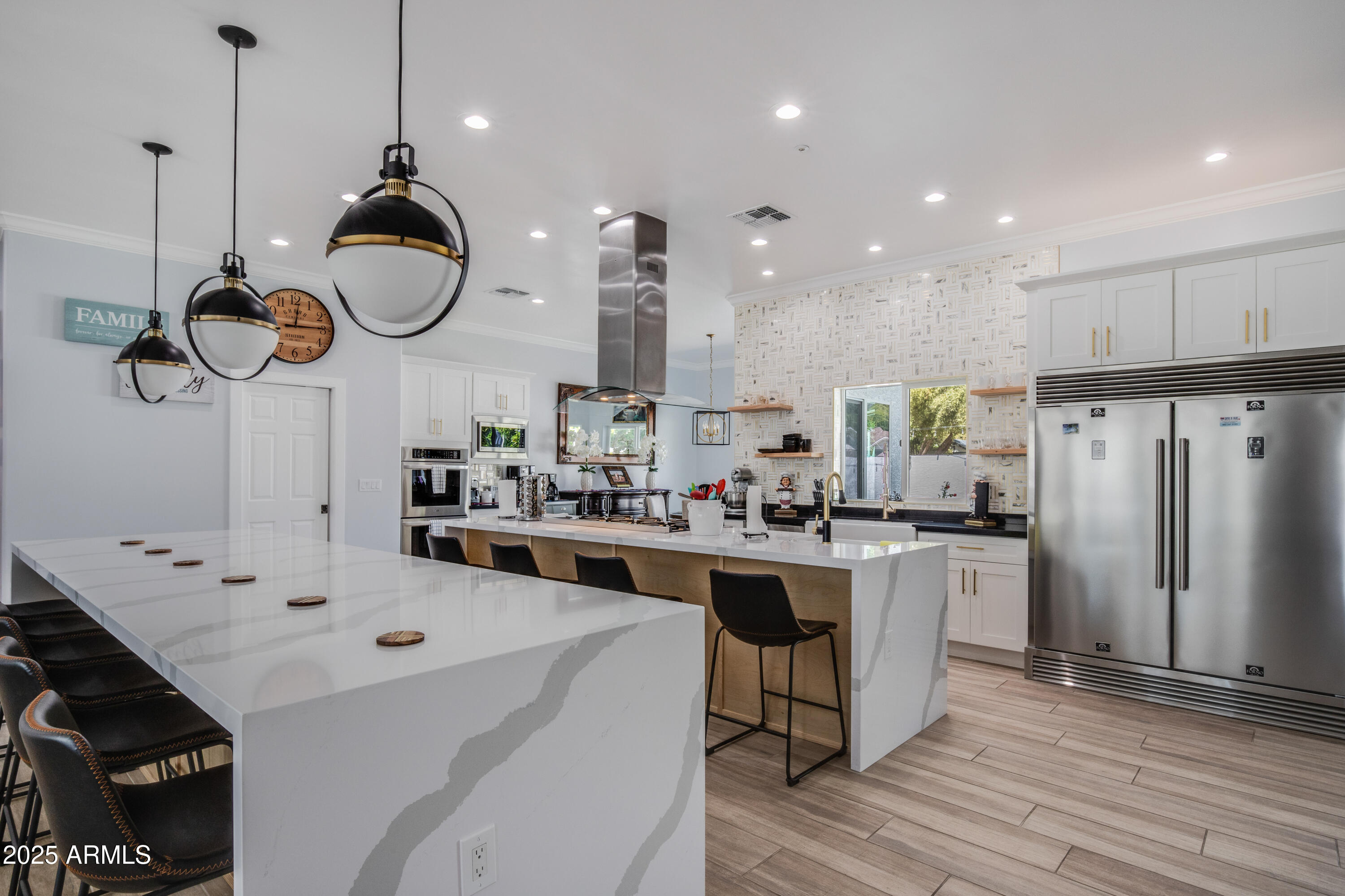 516 West Rancho Drive Phoenix, AZ 85013 - Photo 12 of 46 a kitchen with sink cabinets and stainless steel appliances