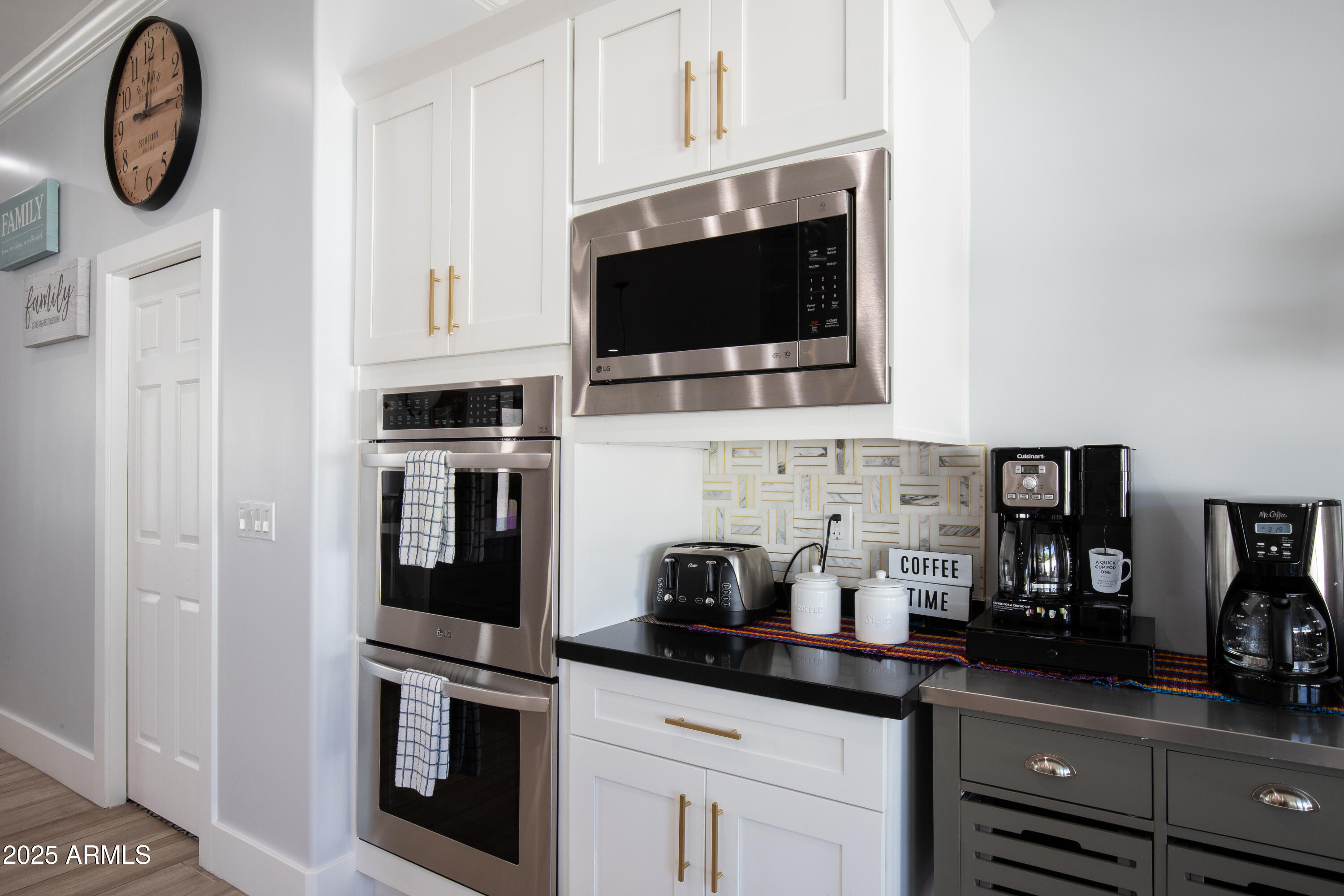 516 West Rancho Drive Phoenix, AZ 85013 - Photo 14 of 46 a kitchen with stainless steel appliances granite countertop a stove a microwave a sink and cabinets