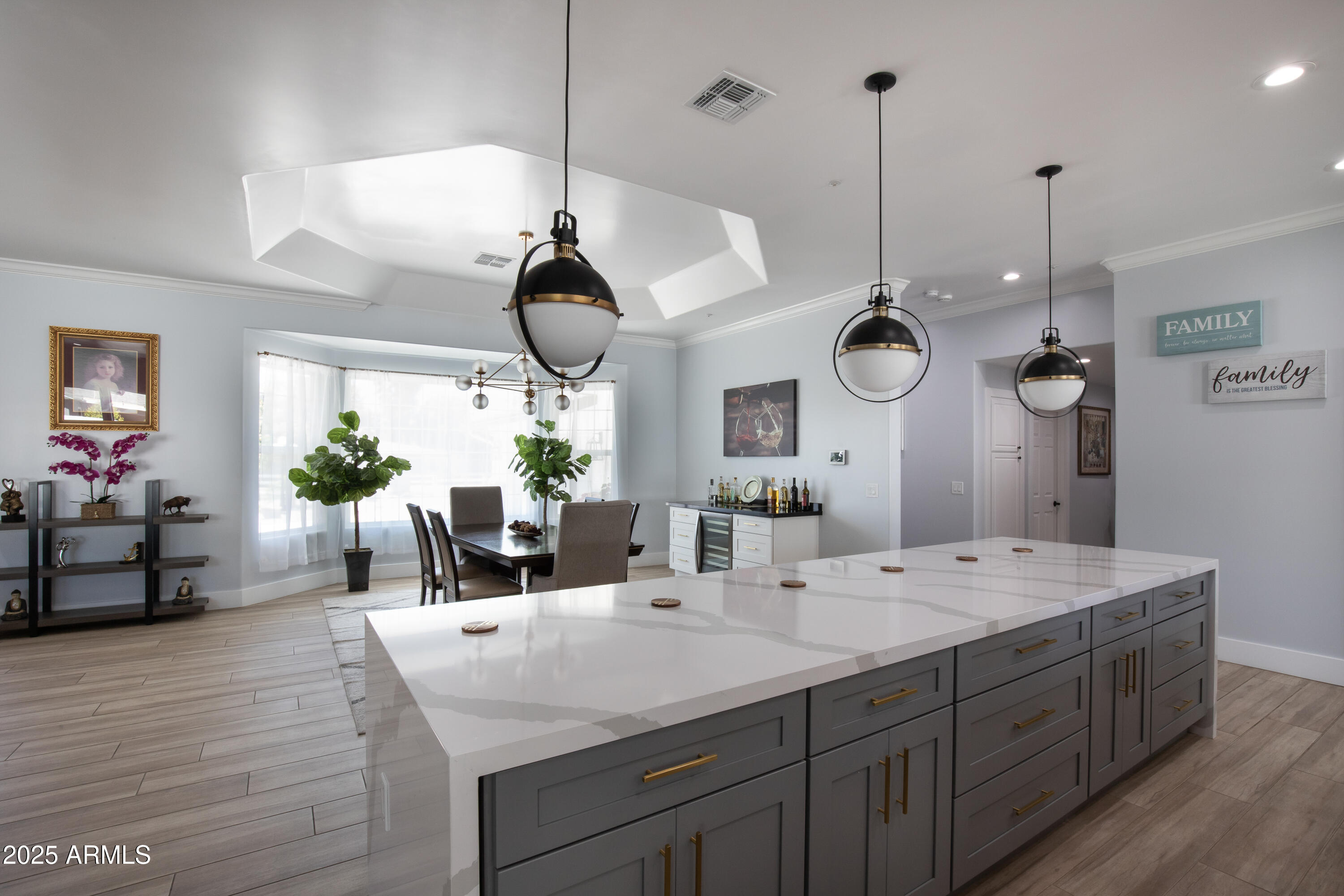 516 West Rancho Drive Phoenix, AZ 85013 - Photo 16 of 46 a kitchen with a counter space cabinets and a chandelier