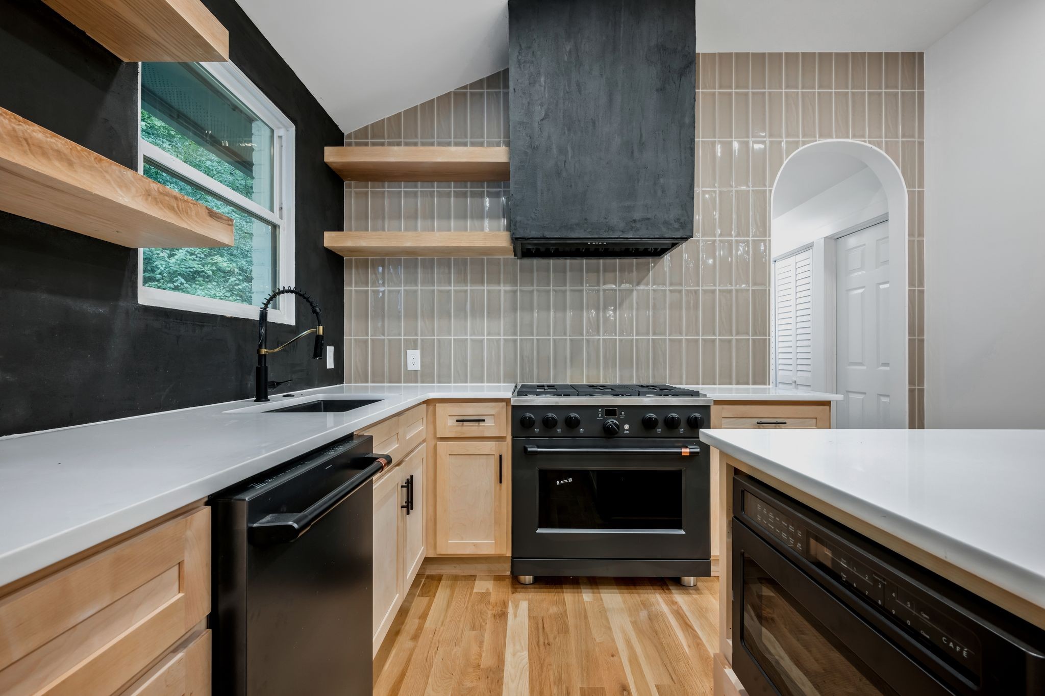 1032 Paint Pony Trail Pegram, TN 37143 - Photo 11 of 30 a kitchen with a sink stove and cabinets