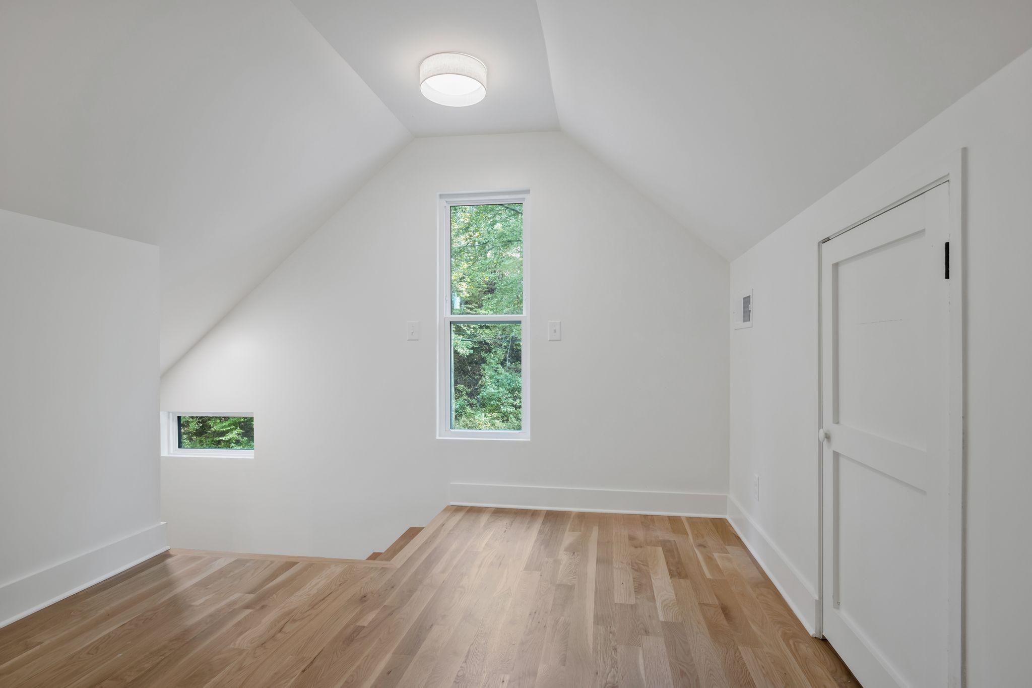 1032 Paint Pony Trail Pegram, TN 37143 - Photo 24 of 30 a view of an empty room with wooden floor and a window