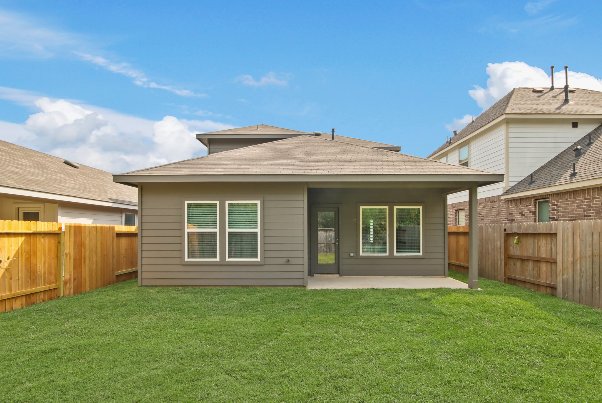 1711 Portia Lane Conroe, TX 77301 - Photo 17 of 26 front view of a house with a yard