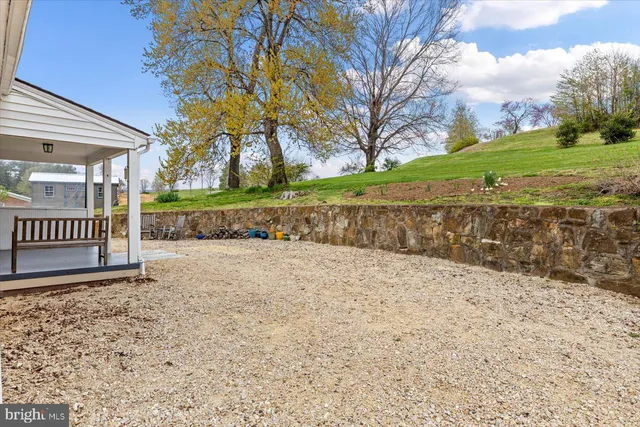 a bathroom with a sink a toilet and a shower
