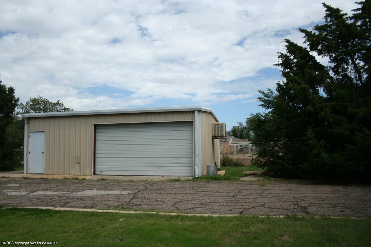 4104 Bowie Street Amarillo, TX 79110 - Photo 18 of 18 a backyard of a house with lots of green space