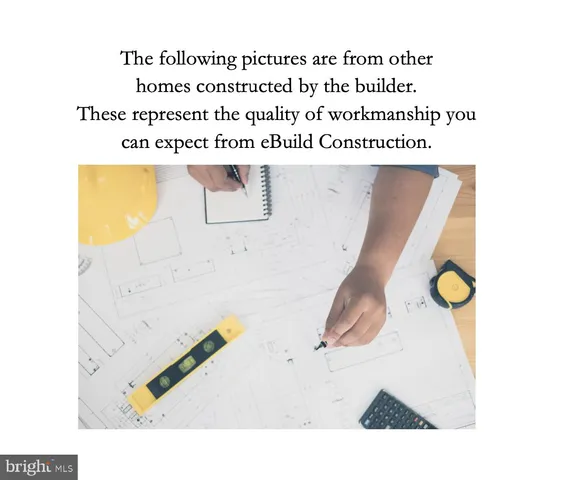 a kitchen with stainless steel appliances a sink a stove and a wooden floor