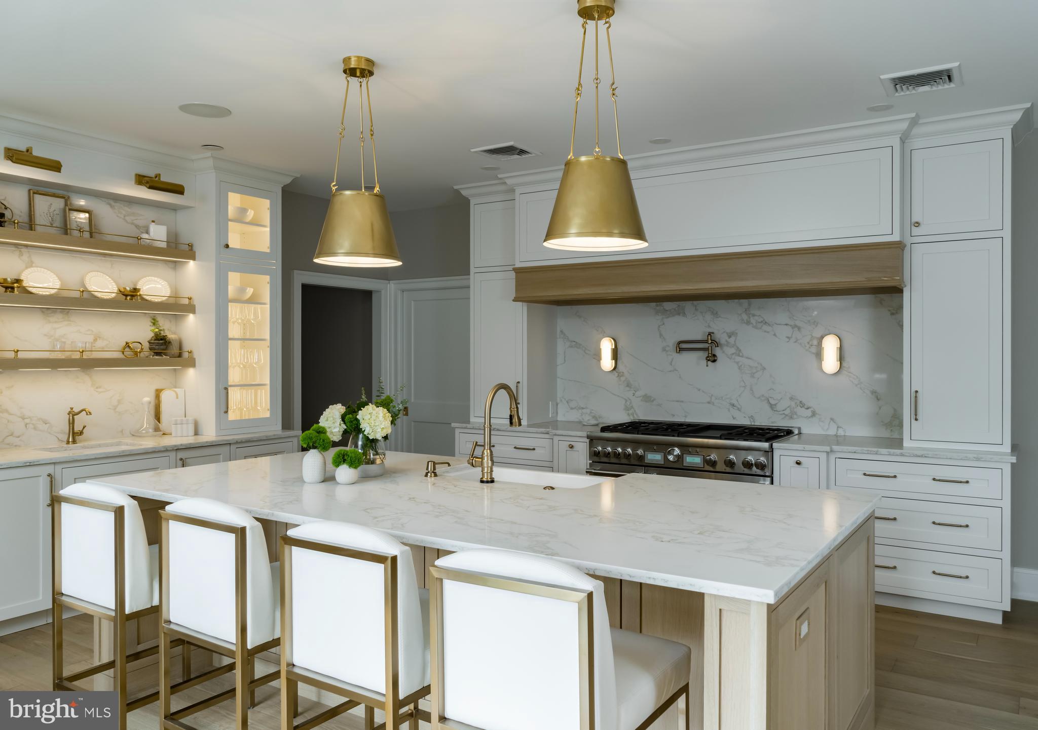 0 Prescott Road Berwyn, PA 19312 - Photo 12 of 30 a kitchen with stainless steel appliances a sink a stove and a wooden floor