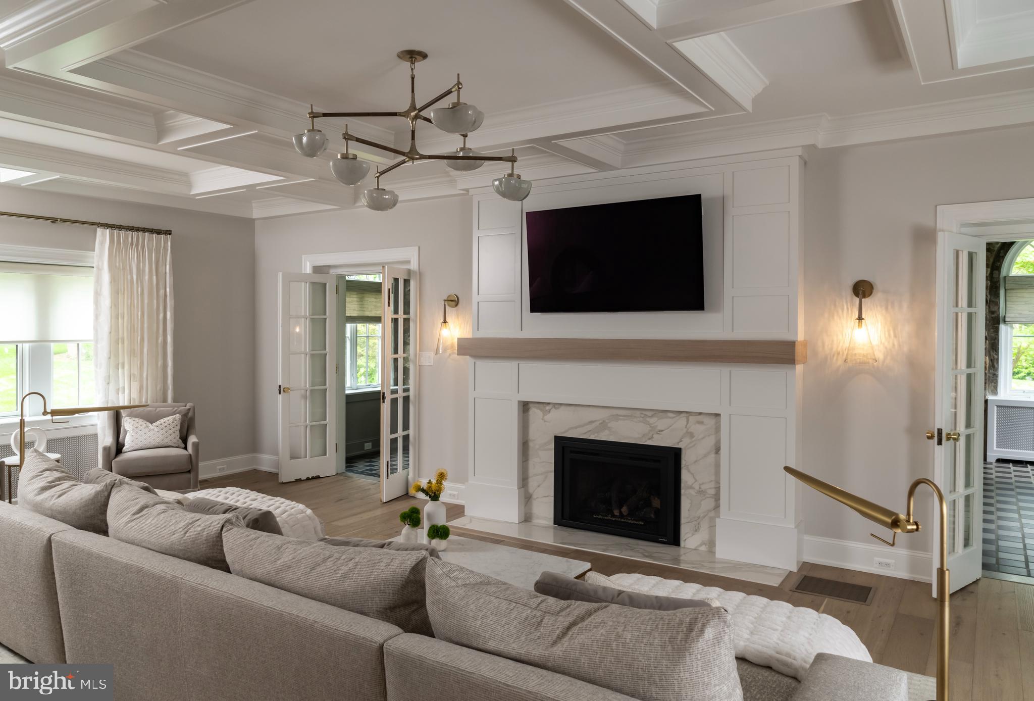 0 Prescott Road Berwyn, PA 19312 - Photo 23 of 30 a living room with furniture a fireplace and a flat screen tv