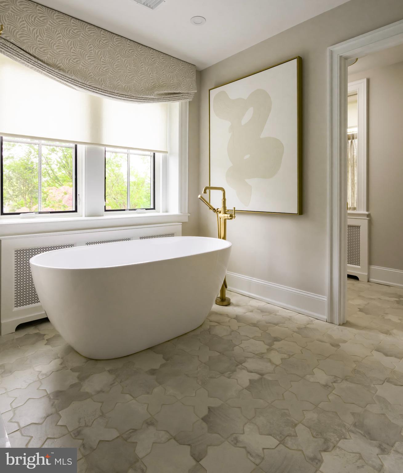 0 Prescott Road Berwyn, PA 19312 - Photo 29 of 30 a white bath tub sitting in a bathroom next to a window