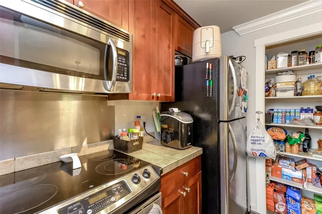 a room with lots of clutter and furniture