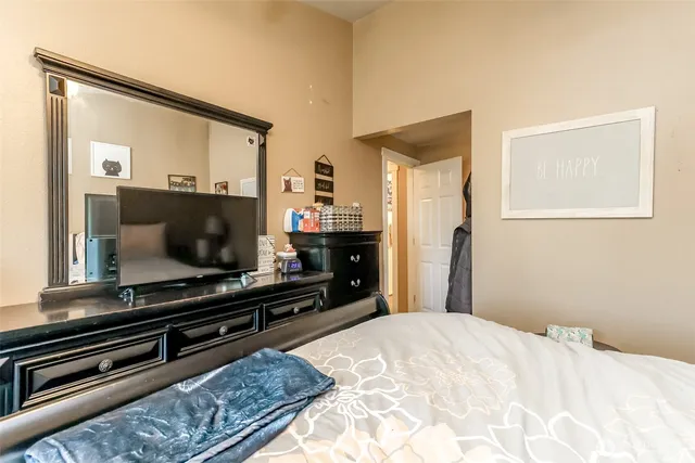 a bathroom with a sink a mirror and a window