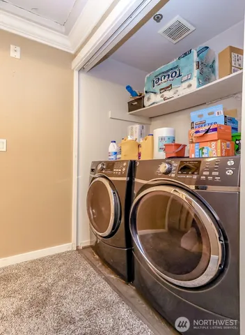 a view of a balcony with chairs