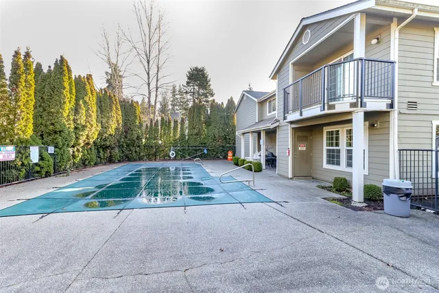 a room with table and chairs