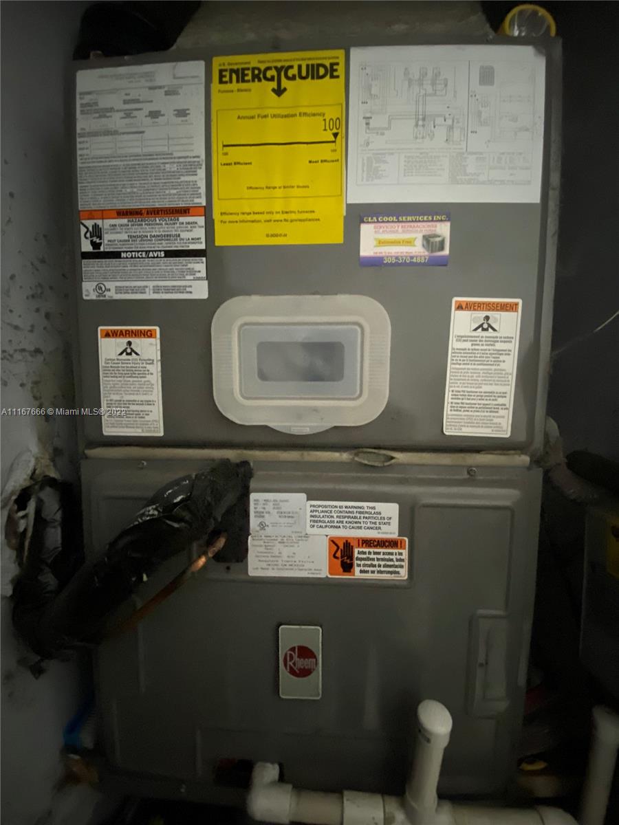 2879 West 75th Terrace Hialeah, FL 33018 - Photo 15 of 16 a close view of cabinet