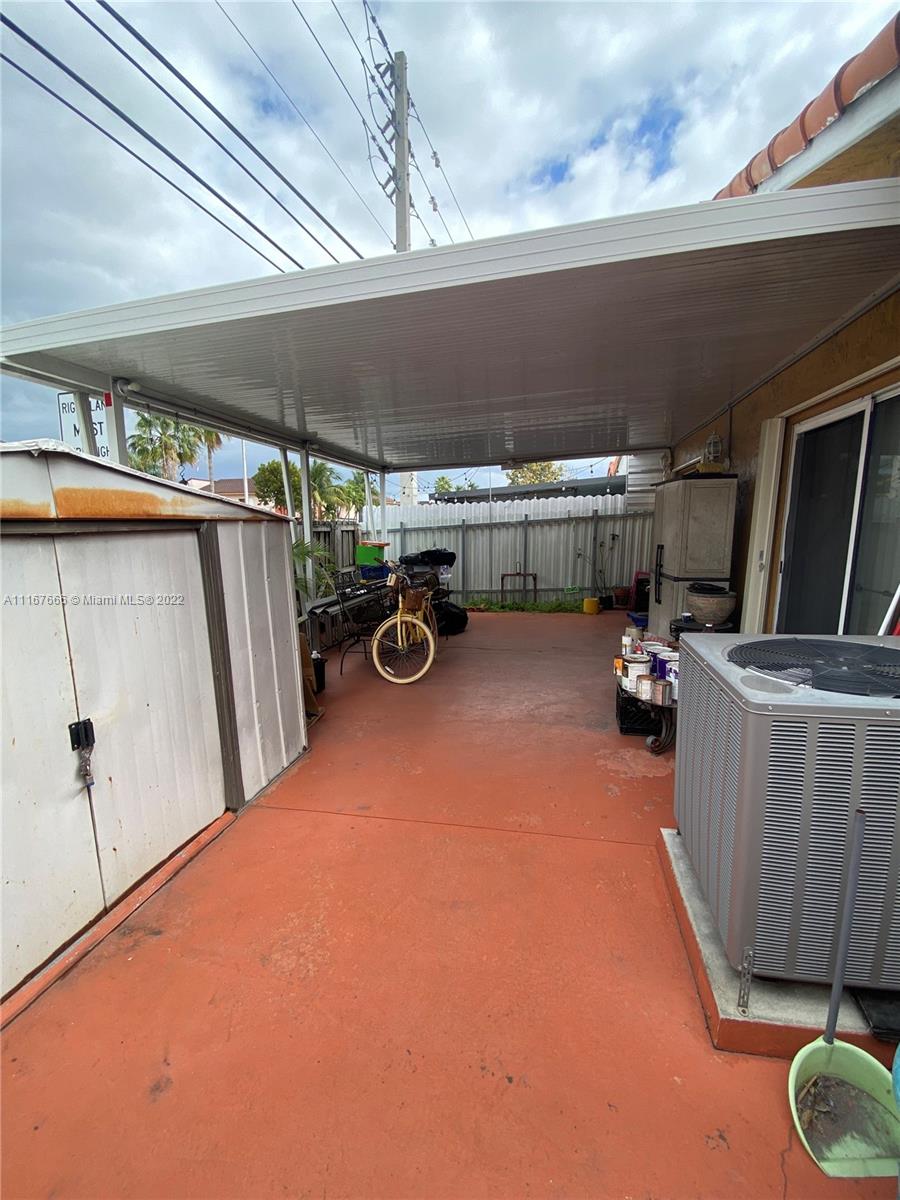 2879 West 75th Terrace Hialeah, FL 33018 - Photo 8 of 16 a view of a storage room