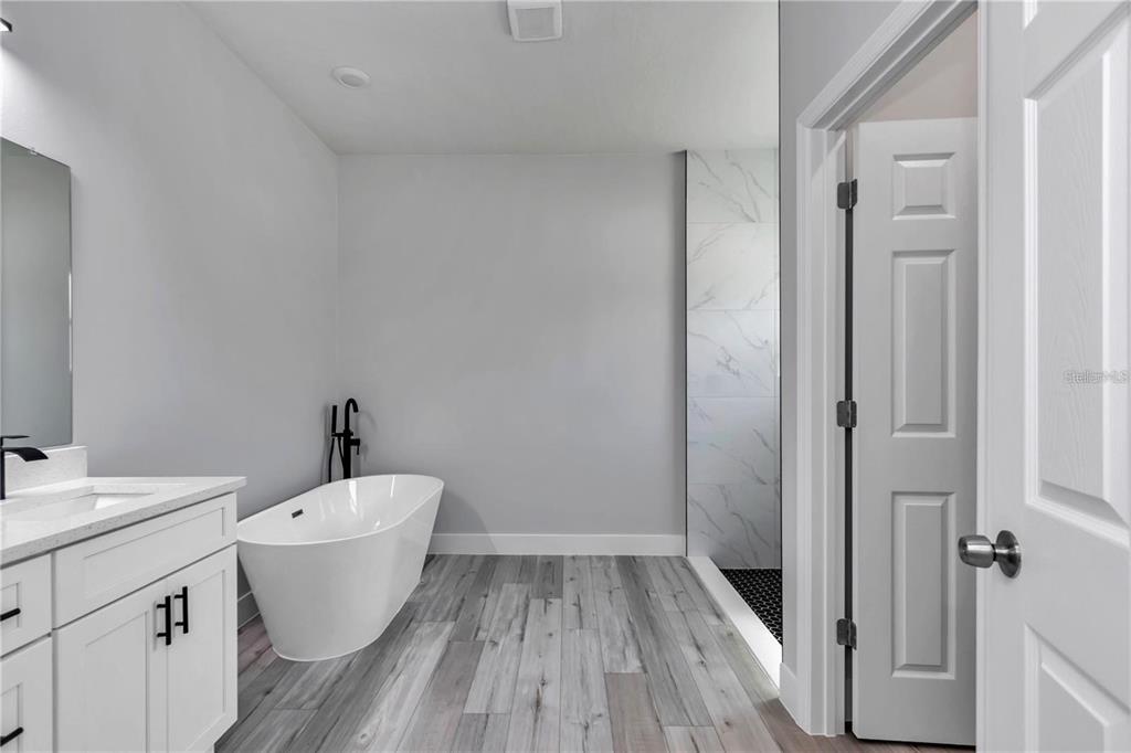 3875 Southwest 169th Ln Road Ocala, FL 34473 - Photo 41 of 46 a bathroom with a sink and a toilet