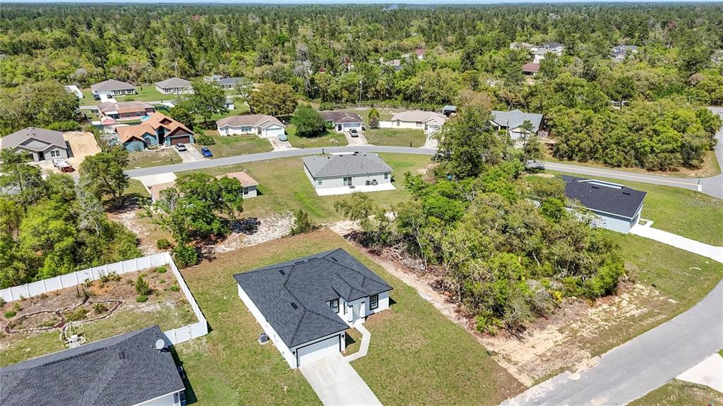 3875 Southwest 169th Ln Road Ocala, FL 34473 - Photo 5 of 46 an aerial view of residential houses with outdoor space