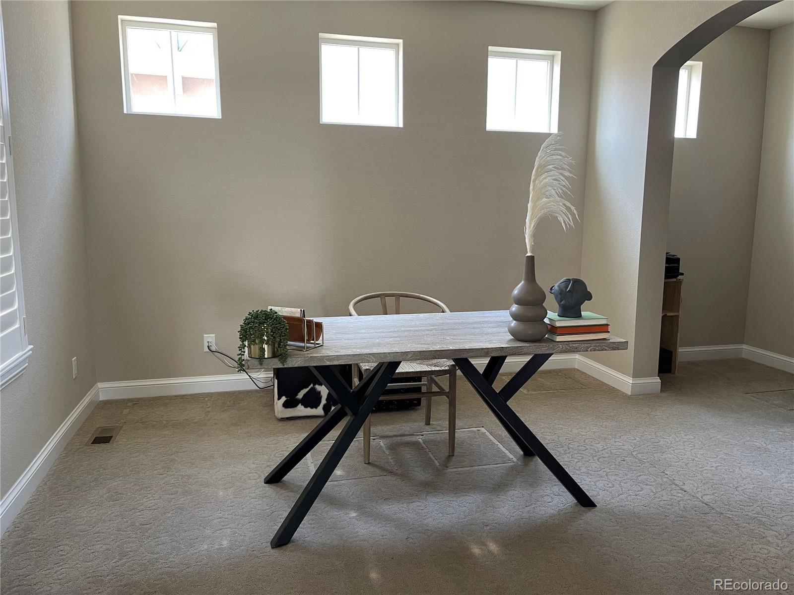 9575 3rd Place Denver, CO 80230 - Photo 11 of 38 a view of a workspace with furniture