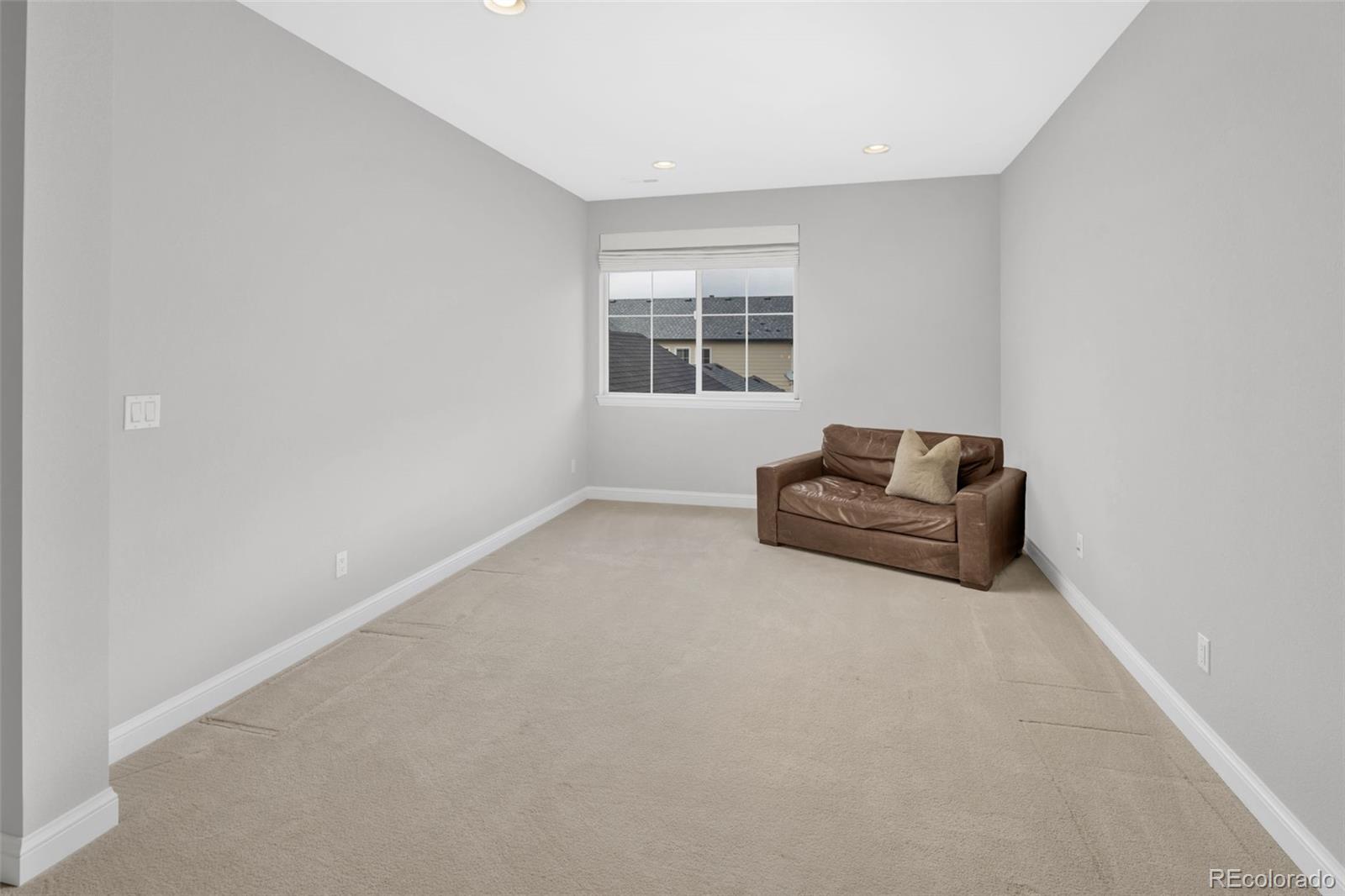 9575 3rd Place Denver, CO 80230 - Photo 16 of 38 a living room with furniture