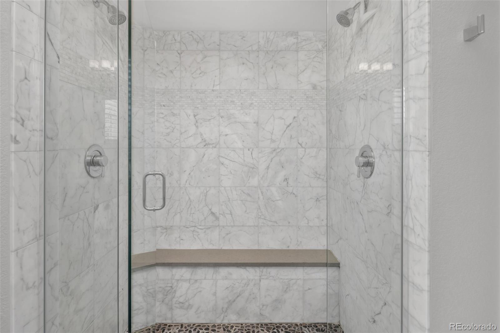 9575 3rd Place Denver, CO 80230 - Photo 22 of 38 a bathroom with a shower