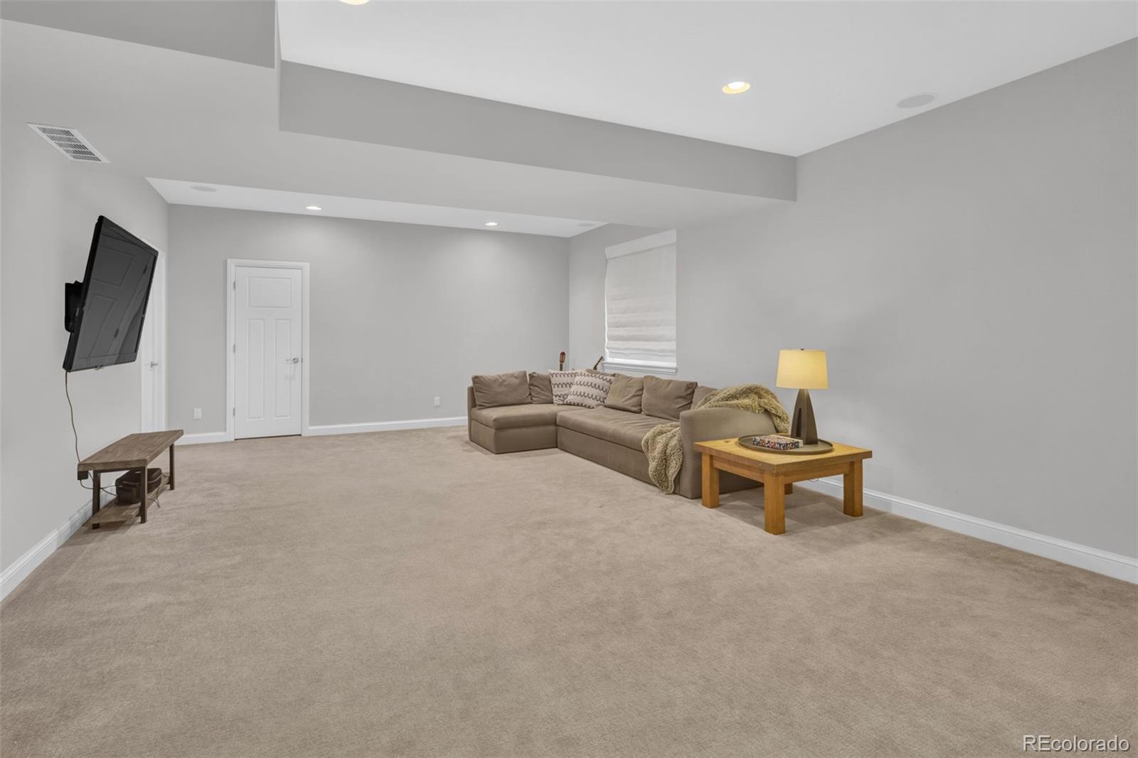 9575 3rd Place Denver, CO 80230 - Photo 27 of 38 a living room with furniture