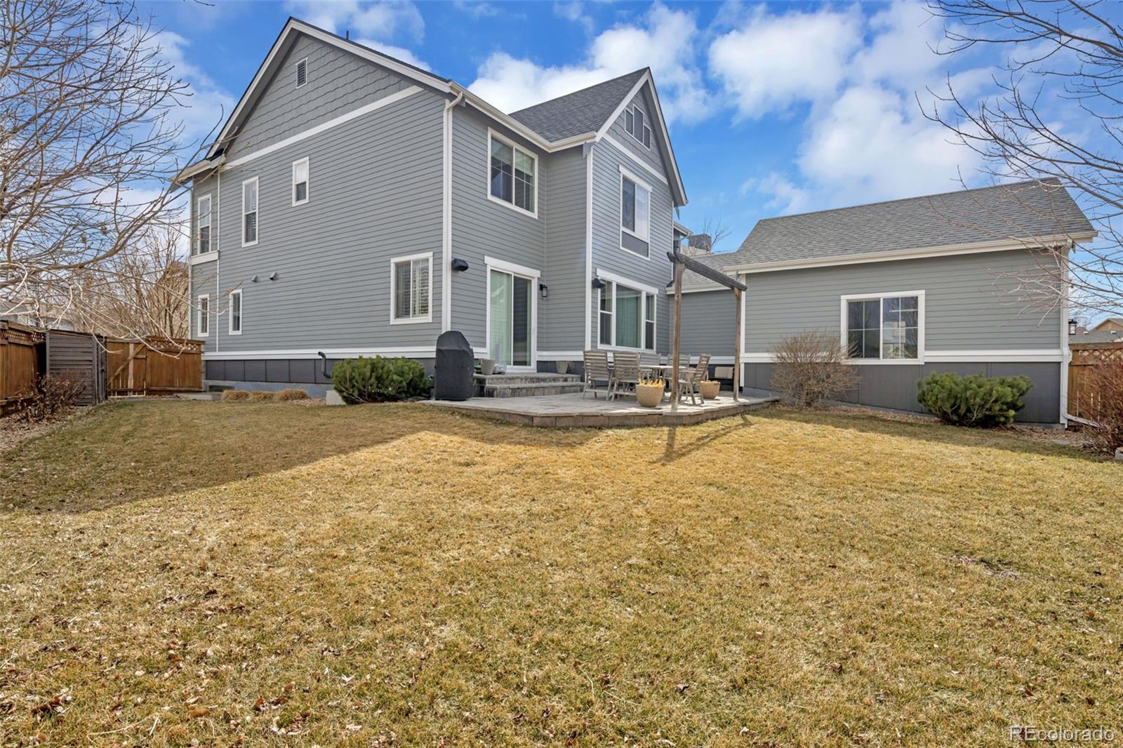 9575 3rd Place Denver, CO 80230 - Photo 32 of 38 a house view with swimming pool in front of it