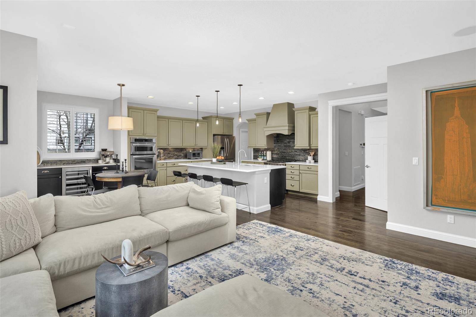 9575 3rd Place Denver, CO 80230 - Photo 5 of 38 a living room with furniture and kitchen view