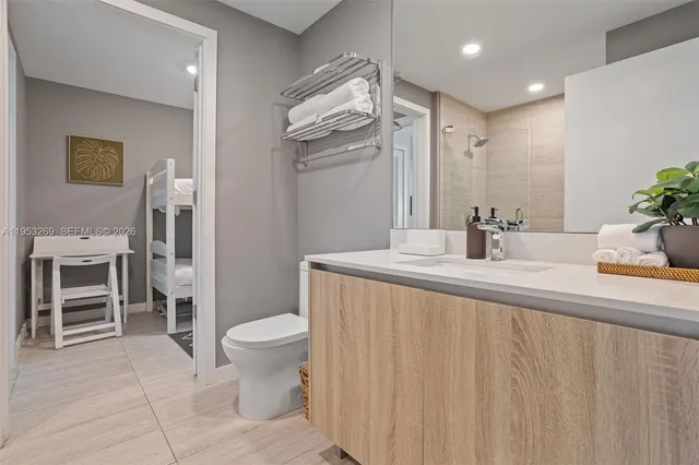 a balcony view with couple of chairs