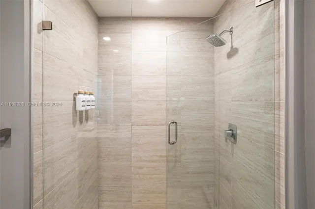 a view of balcony with furniture and potted plants