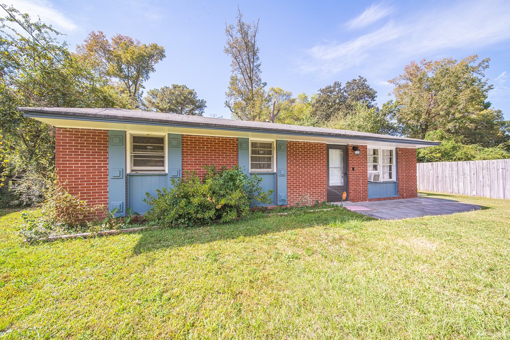 4642 Wellborn Drive Columbus, GA 31907 - Photo 2 of 2 a view of a house with backyard and garden