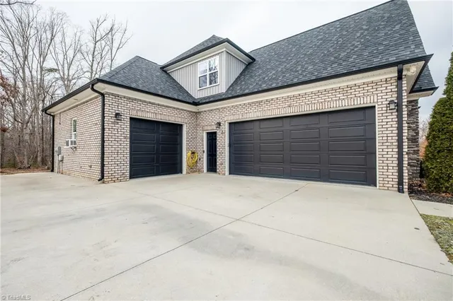 $989,900 | 6765 Lake Brandt Road, Summerfield, NC 27358