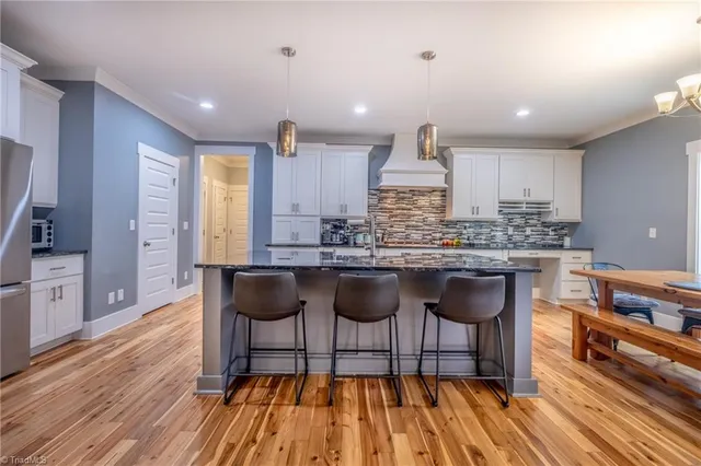 $989,900 | 6765 Lake Brandt Road, Summerfield, NC 27358