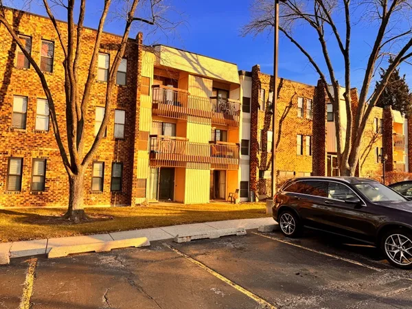 a car parked in front of a house