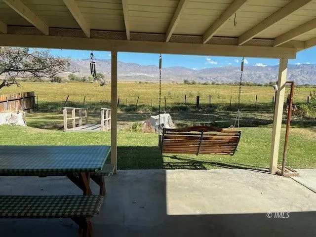 a garden view with a sitting space